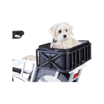 A small dog sitting inside a basket attached to the rear of an ebike. 