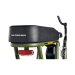 Rear view of black Passenger Package seat on green RadRunner ebike with Rad Power Bikes printed on the rear seat wall.