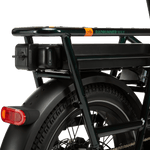 A black range extender mounted on a green electric bike.